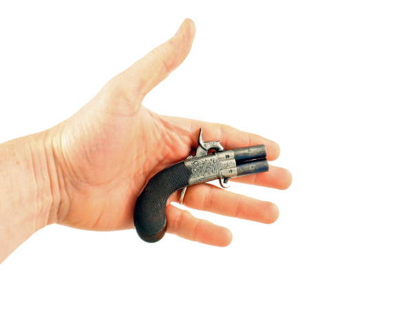 A Tiny Percussion Turn-Over Pistol.