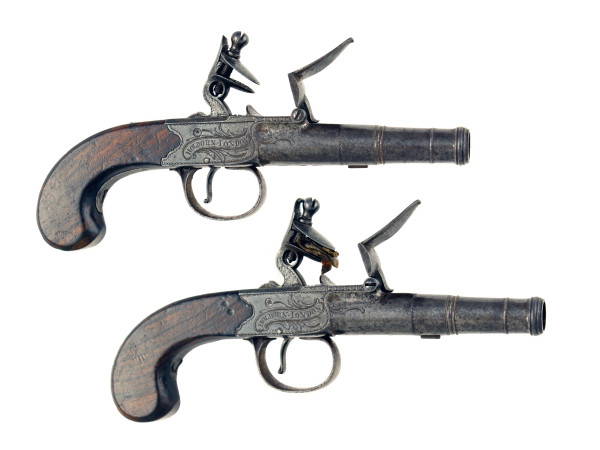 A Crisp Pair of Cannon Barrel Pistols by Clark of London.