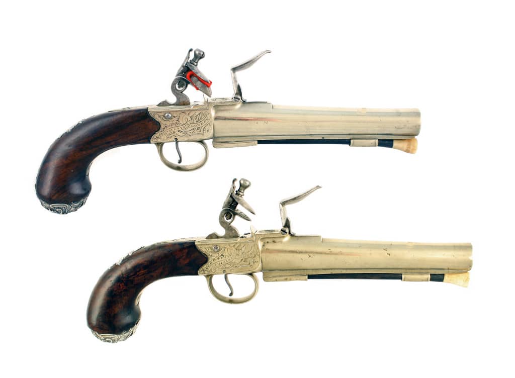 A Large Pair of Tutaneg Silver Mounted Officers Pistols.