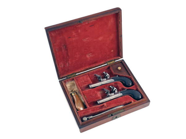 A Cased Small Pair of Round Framed Pistols.
