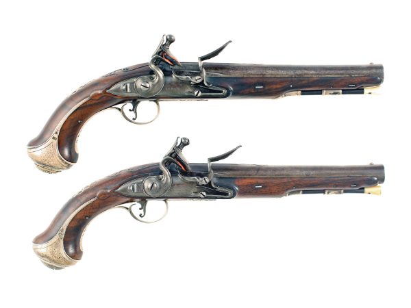 A Sleepy Pair of Silver Mounted Holster Pistols by Barbar of London.