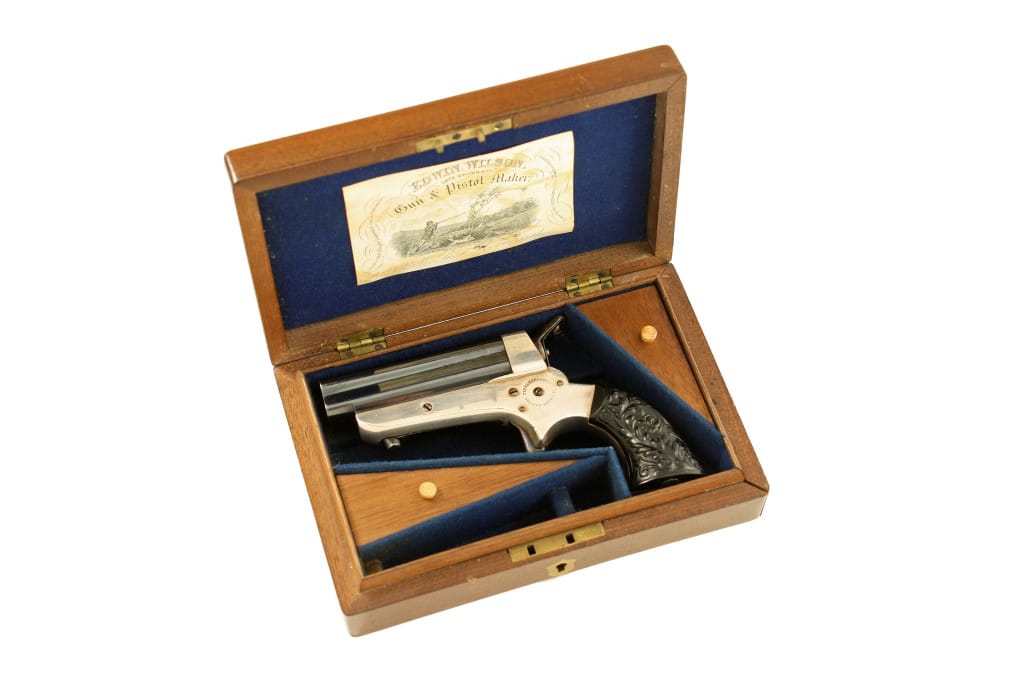A Good Cased Tipping & Lawden 4 Shot Derringer