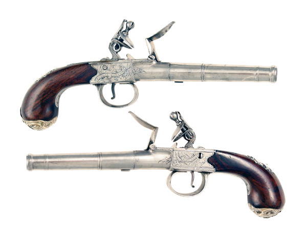 A Fine Pair of Silver Mounted Pistols by Heylin.