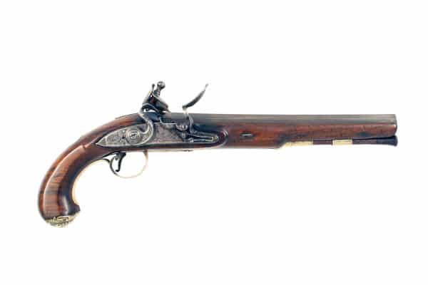 A Flintlock Holster Pistol by Hutchinson of Dublin.
