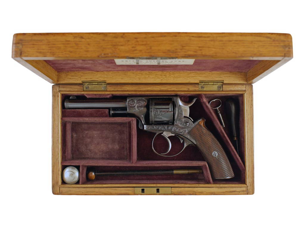 A Stunning Engraved Rim Fire Revolver by Parker Field & Sons